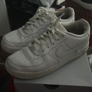 Worn Air Force 1s